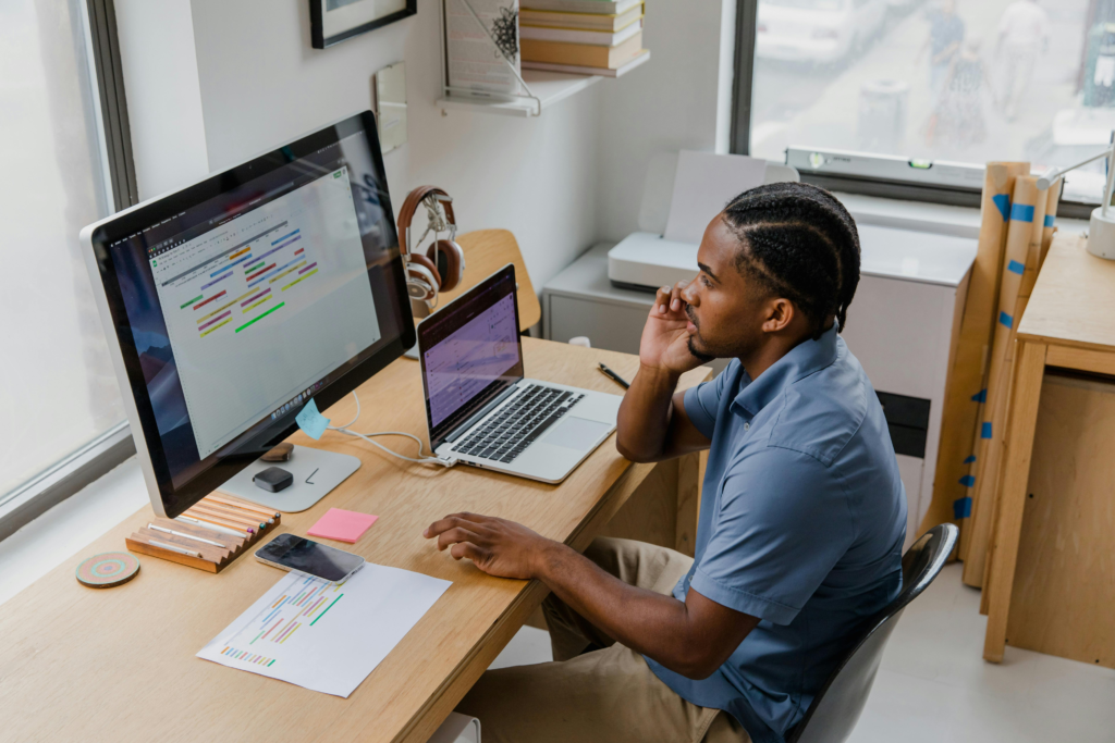 Sitting Man Working in Office