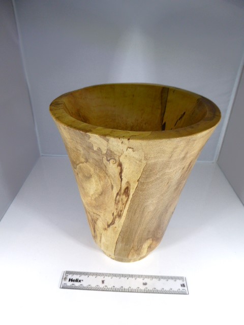 an image of a wooden vase